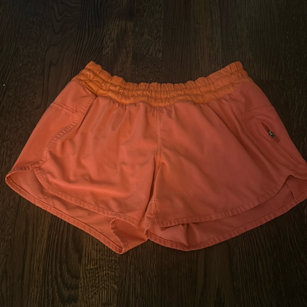 Orange Lululemon shorts